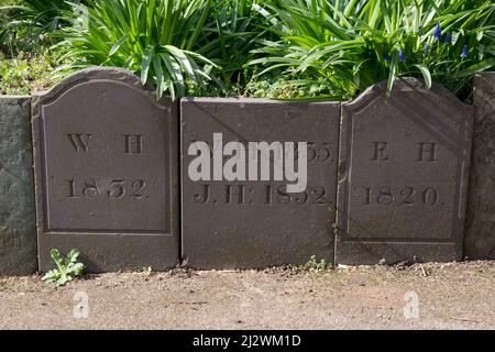 Old gravestones in St. Catherine`s churchyard, Burbage, Leicestershire, England, UK Stock Photo